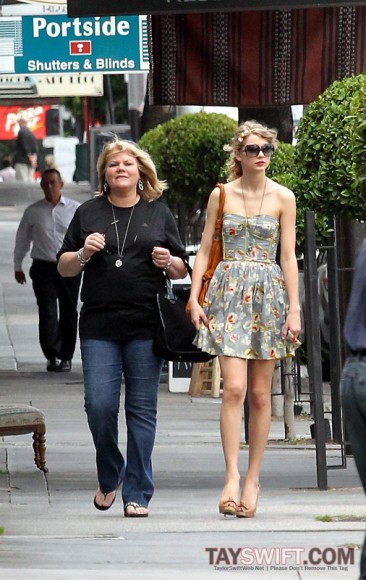 Taylor Swift in a strapless flowery dress