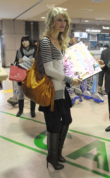 Taylor Swift in a striped cardigan