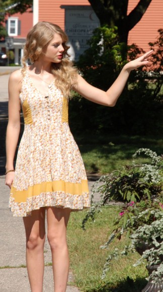 Taylor Swift in a yellow modcloth dress