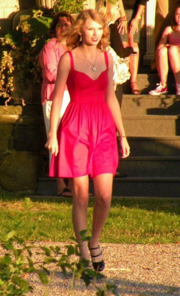 Taylor Swift in a red sweetheart dress