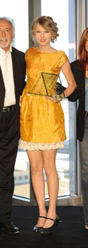 Taylor Swift in a yellow dress