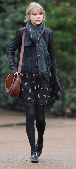 Black cat print dress, black jacket, tan bag and black oxfords in London