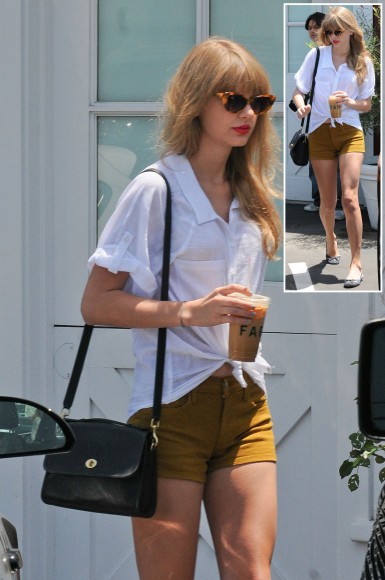 Taylor swifts mustard yellow shorts and cat eye glasses